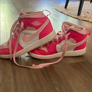 Nike Girl’s Pink and White High-Top Sneakers